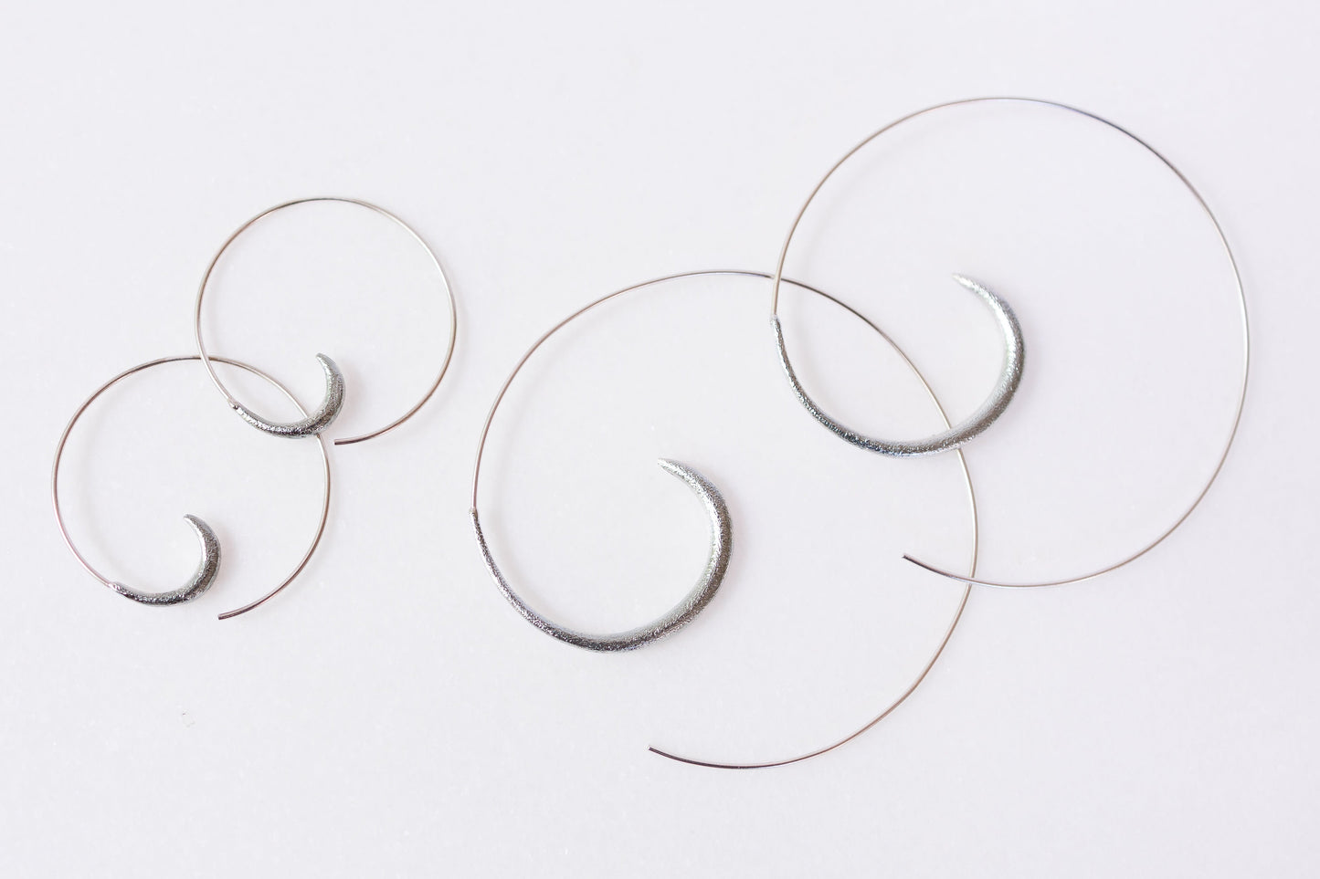 Silver Swirl Hoop Earrings