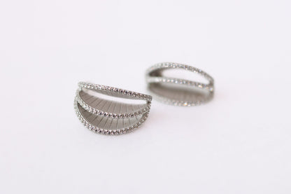 Two silver rings on a white background