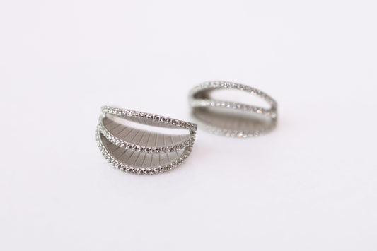 Two silver rings on a white background